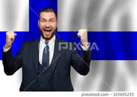 Finnish happy businessman on the background of flag of Finland Business Finnish happy businessman on the background of flag of Finland Business 103605255