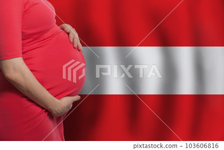 Austrian pregnant woman belly on flag of Austria background 103606816