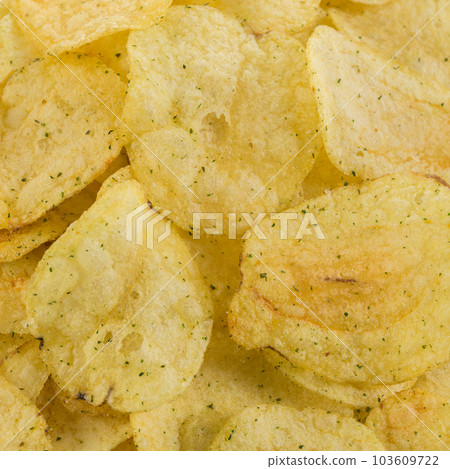 Prepared potato chips snack closeup view Prepared potato chips snack closeup view 103609722