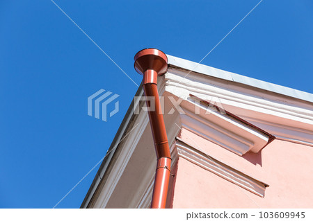 Rain gutter on house Rain gutter on house 103609945
