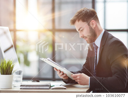 Close Up Of Businessman Taking Folders From Hand Close Up Of Businessman Taking Folders From Hand 103610077