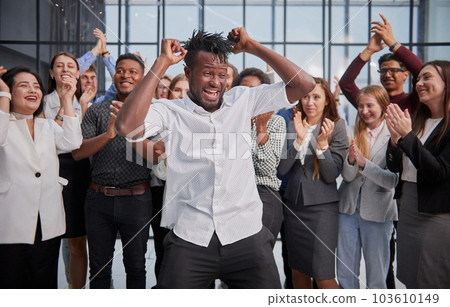 Happy diverse professional business team stand in office looking at camera, Happy diverse professional business team stand in office looking at camera, 103610149