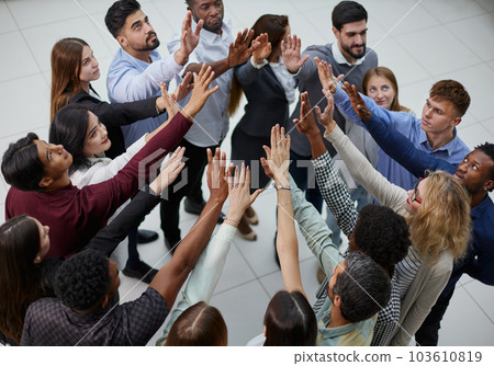 People of different ethnicities uniting to cooperate together People of different ethnicities uniting to cooperate together 103610819