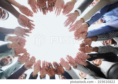 People of different ethnicities uniting to cooperate together 103610822