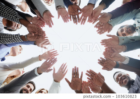 People of different ethnicities uniting to cooperate together 103610823