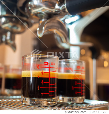 perfect double shot espresso hot black coffee crema aroma morning glass cup drink espresso machine coffee maker fresh cafe caffeine brown beverage barista bar breakfast background selected focus 103611122