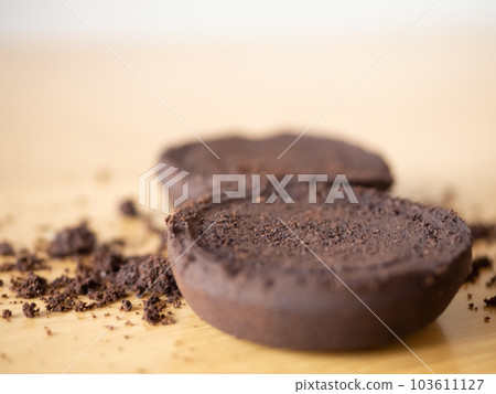 coffee grounds after bean extraction espresso machine perfect cookie powder pile brown roasted dark black drink caffeine food fresh ingredient beverage on wooden table background selected focus 103611127