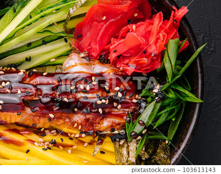 Hawaiian salmon poke bowl with cucumber, mango and pickled ginger Hawaiian salmon poke bowl with cucumber, mango and pickled ginger 103613143