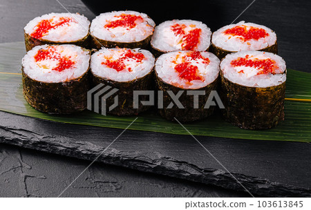 Sushi with red caviar on black stone 103613845