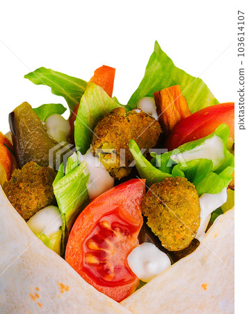 Falafel and fresh vegetables in pita bread Falafel and fresh vegetables in pita bread 103614107