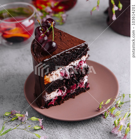 Chocolate cake with cherries and chocolate cream Chocolate cake with cherries and chocolate cream 103614201