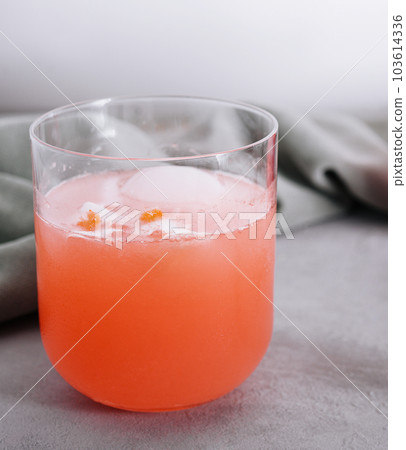Carrot Cocktail in glass with cubes Ice Carrot Cocktail in glass with cubes Ice 103614336