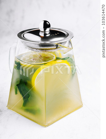 Tasty cold ice tea on table Tasty cold ice tea on table 103614470