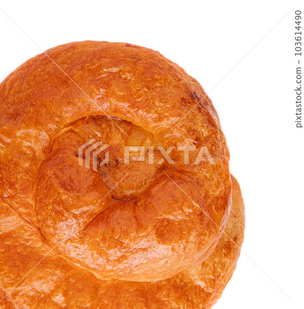 Puff pastry bun rolled up in the form of a snail 103614490