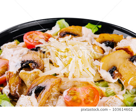 Warm salad with roasted chicken meat, vegetables and mushrooms 103614602
