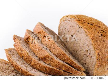 Black bread with seeds on white 103614869