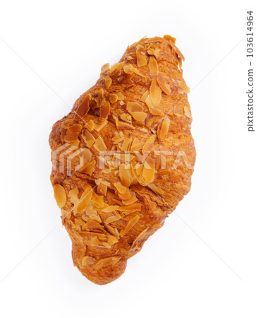 French fresh croissant with almond shavings 103614964