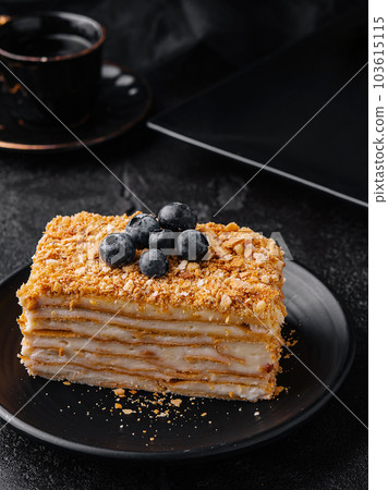 cake napoleon with blue blueberries and tea cup cake napoleon with blue blueberries and tea cup 103615115