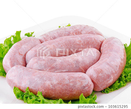 Fresh raw pork bratwurst isolated on a white background Fresh raw pork bratwurst isolated on a white background 103615295