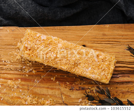 napaleon cake on wood on top view 103615552