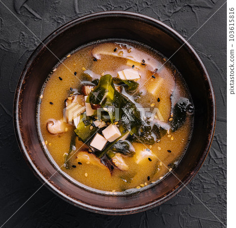 Soup with algae and mushrooms top view Soup with algae and mushrooms top view 103615816