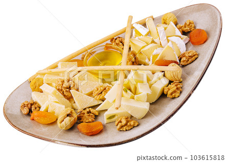 cheese plate with walnuts and honey cheese plate with walnuts and honey 103615818