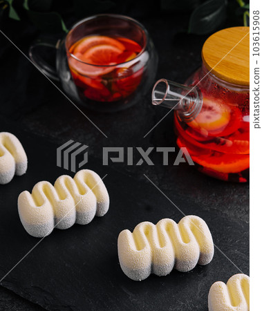 Contemporary Three Chocolates Mousse Cakes on stone Contemporary Three Chocolates Mousse Cakes on stone 103615908