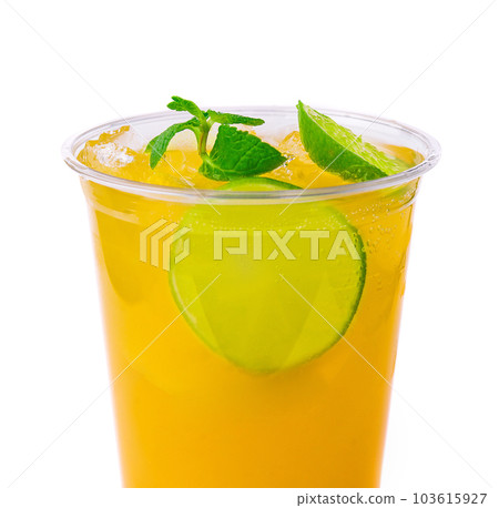 Alcohol cocktails with orange juice and lime slices Alcohol cocktails with orange juice and lime slices 103615927