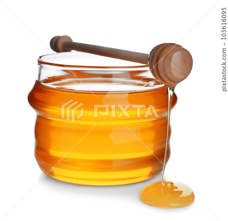 Jar of organic honey and dipper isolated on white 103616095