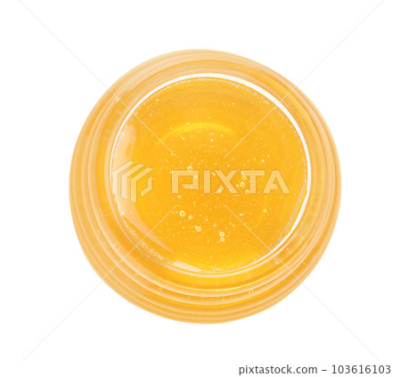 Jar of organic honey isolated on white, top view 103616103