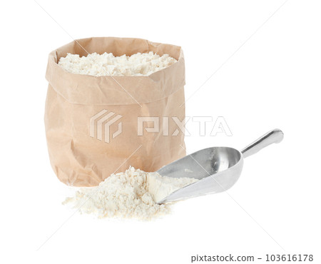 Paper bag and scoop with flour isolated on white 103616178