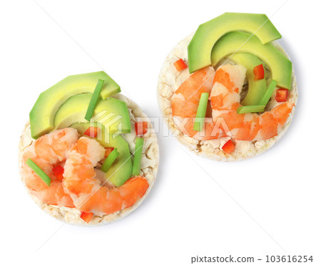 Puffed rice cakes with shrimps and avocado isolated on white, top view 103616254