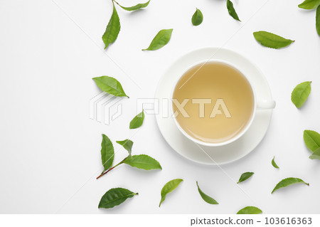 Flat lay composition with green tea on white background Flat lay composition with green tea on white background 103616363