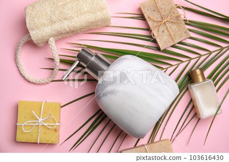 Flat lay composition with marble soap dispenser on pink background Flat lay composition with marble soap dispenser on pink background 103616430