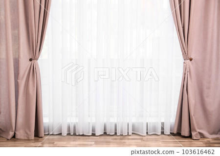 Window with elegant curtains in empty room 103616462