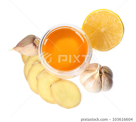 Fresh garlic and other natural cold remedies isolated on white, top view Fresh garlic and other natural cold remedies isolated on white, top view 103616604
