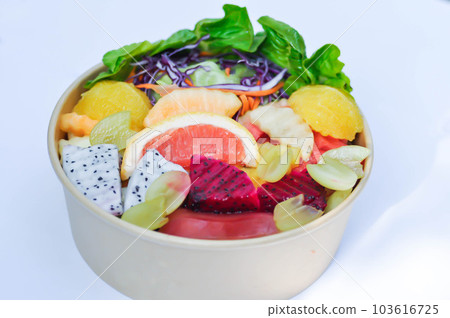fruit and vegetable salad or orange, dragon fruit and lettuce salad fruit and vegetable salad or orange, dragon fruit and lettuce salad 103616725