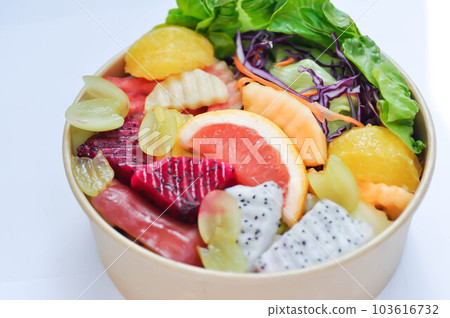 fruit and vegetable salad or orange, dragon fruit and lettuce salad 103616732