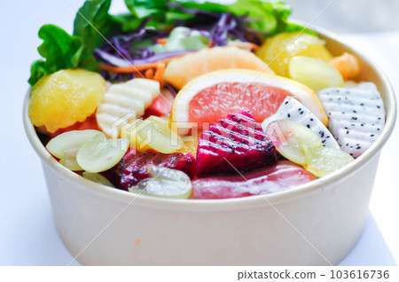 fruit and vegetable salad or orange, dragon fruit and lettuce salad fruit and vegetable salad or orange, dragon fruit and lettuce salad 103616736