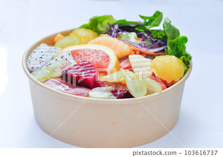 fruit and vegetable salad or orange, dragon fruit and lettuce salad fruit and vegetable salad or orange, dragon fruit and lettuce salad 103616737