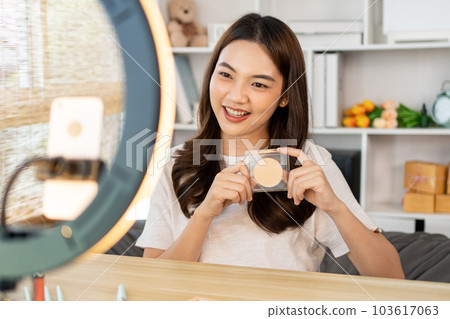 Beautiful women with social media influences recommend products and make-up accessories to be more beautiful, Recording vlog video live streaming, Online business of beauty bloggers. Beautiful women with social media influences recommend products and make-up accessories to be more beautiful, Recording vlog video live streaming, Online business of beauty bloggers. 103617063