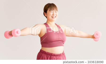 Chubby girl doing training plus size model image 103618090