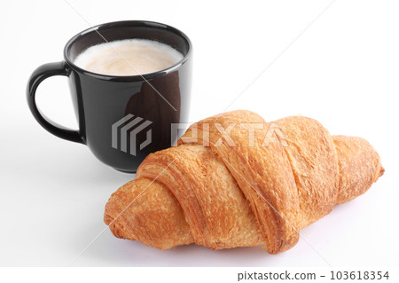Tasty fresh croissant and coffee on white background Tasty fresh croissant and coffee on white background 103618354