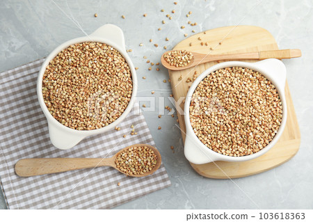 Flat lay composition with green buckwheat on marble table Flat lay composition with green buckwheat on marble table 103618363