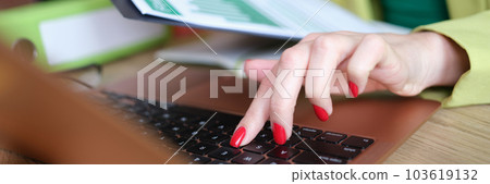 Woman manager typing statistics data of financial report Woman manager typing statistics data of financial report 103619132