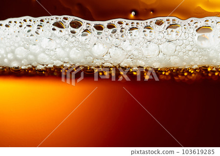 Glass of tasty beer with foam, closeup. Glass of tasty beer with foam, closeup. 103619285