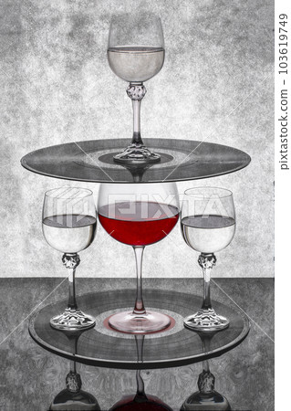 Still life with a glass of red wine with vinyl records 103619749