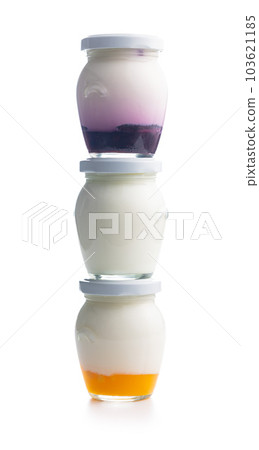 White and fruity yogurt in jar isolated on white background. White and fruity yogurt in jar isolated on white background. 103621185