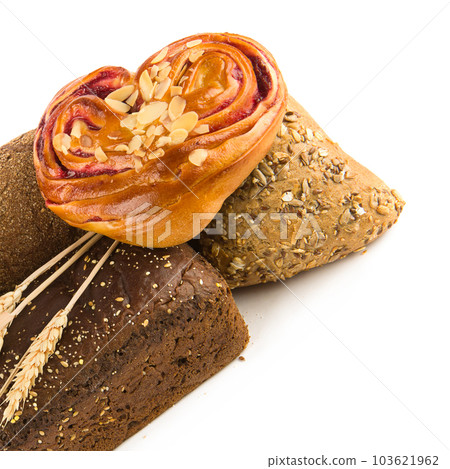 Bread, ciabatta, baguette and ears of wheat isolated on white . Free space for text. Bread, ciabatta, baguette and ears of wheat isolated on white . Free space for text. 103621962