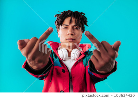 African man on blue with middle fingers - gesture of fuck. Expression negative 103624420